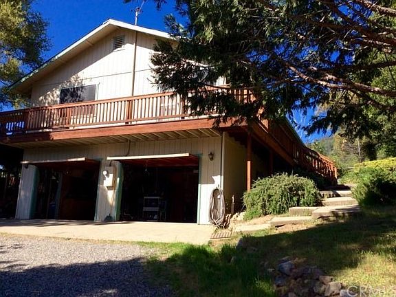 Left side of house with a spacious garage.