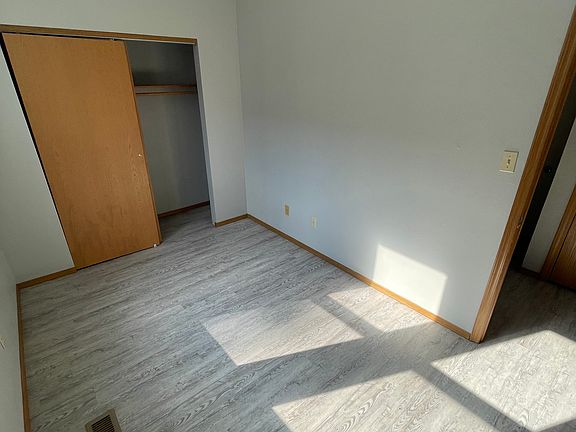 One of the three bedrooms, located on the first floor just steps away from the living room.