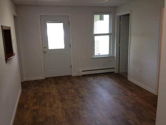 Dining Room, new floors & windows, laundry room to right