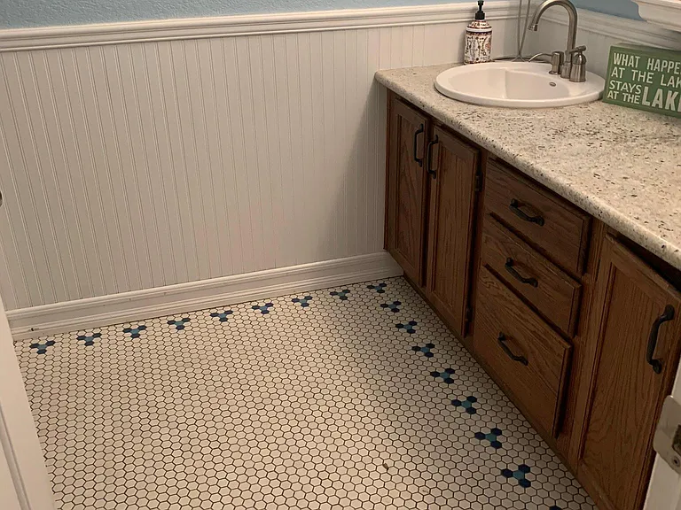double sink vanity in the kid/guest bath