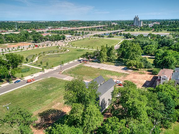 Modern 3-Story Home with Park Views & Chef's Kitchen _ Steps from Scissortail Park, Bricktown, and Downtown OKC Attractions