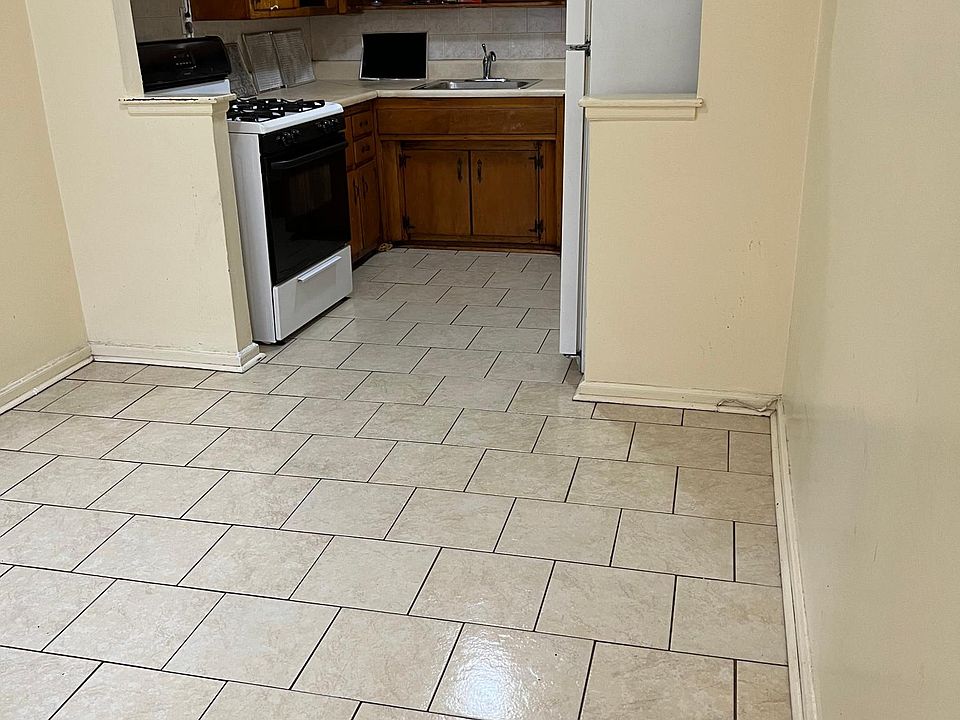 1st image of 1056 E 222nd St Floor 1