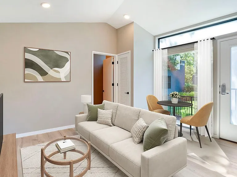 Freestanding home dining and living room with hard surface flooring
