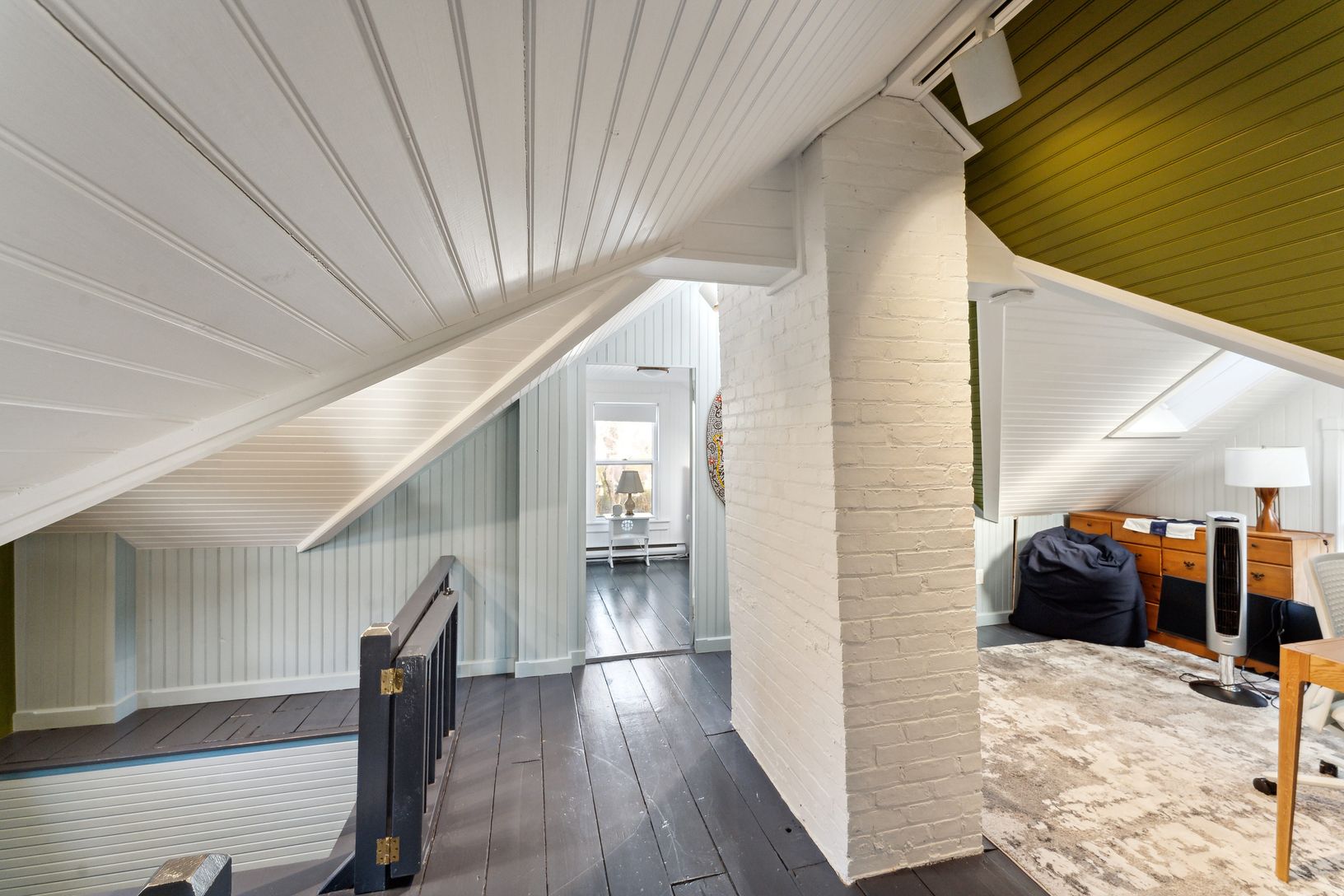 third floor has two bedrooms on opposite sides