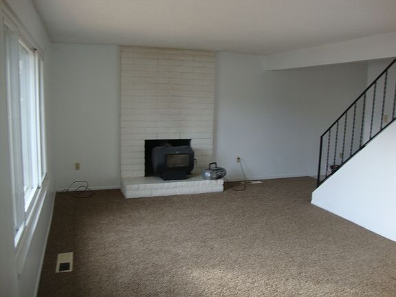 living room with fireplace insert