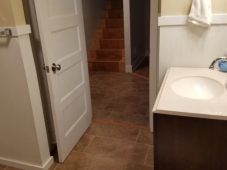 Laundry room/bathroom just off family room
