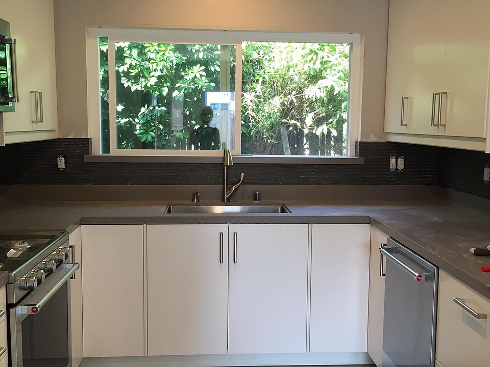 A cooks kitchen with all kitchenaide appliances! Hardwood floors throughout.