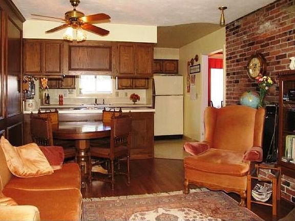 Family Room w/ den hidden behind finger wall