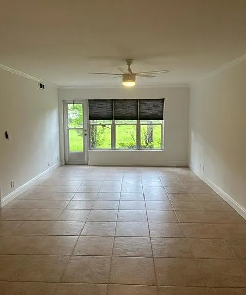 Living room with view of the back garden.