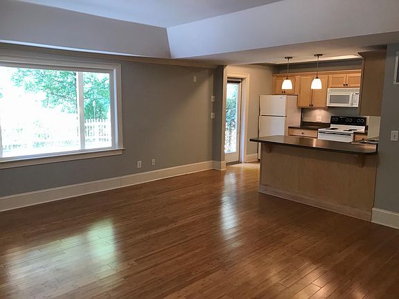 Gleaming bamboo floors throughout. Plenty of room for counter stools and a breakfast table just outside of kitchen.