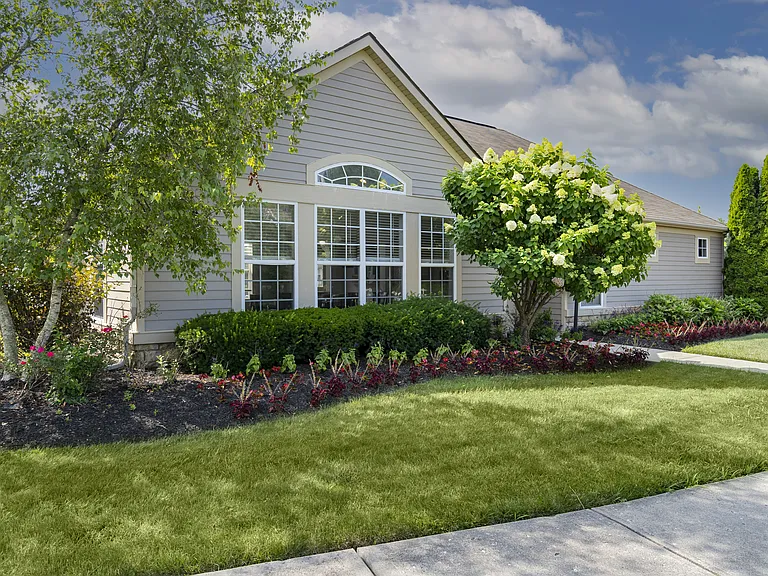 Step into our inviting clubhouse, surrounded by greenery and thoughtful landscaping, the perfect hub for community gatherings.