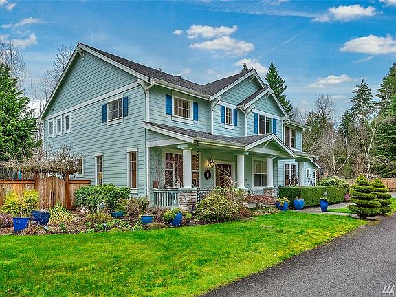 This gracious home with beautiful gardens has been lovingly maintained.  