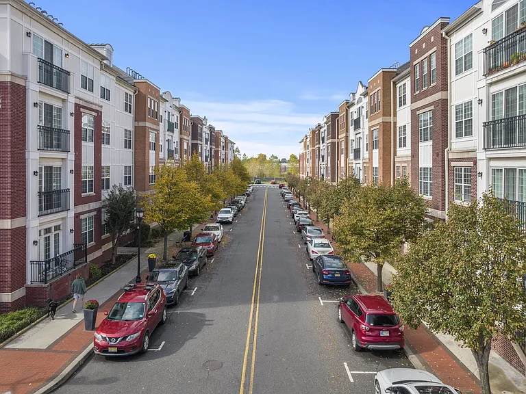 street view with apartments on both sides of the street at Harbor Pointe, Bayonne, NJ