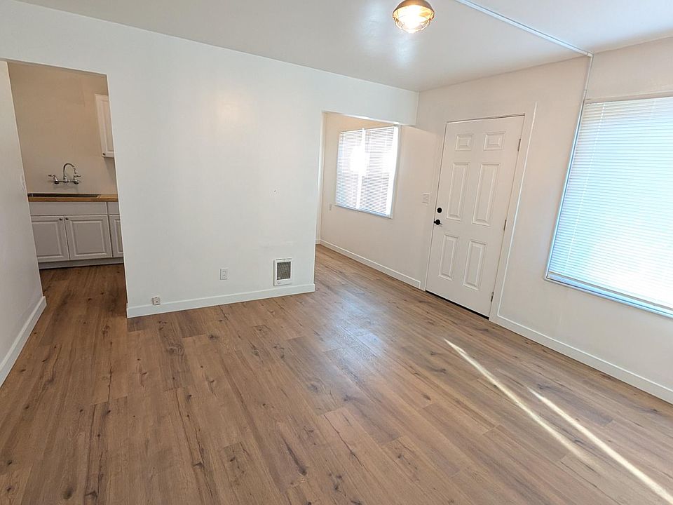 Living room with new plank flooring for easy care