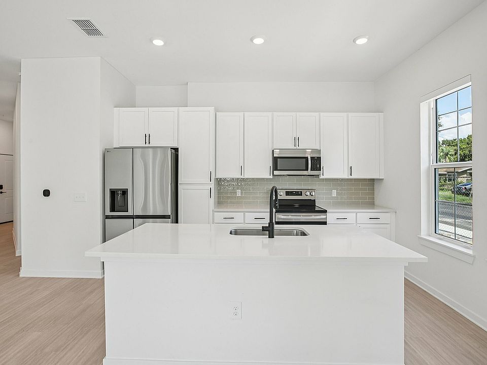 Kitchen with White Cabinets
