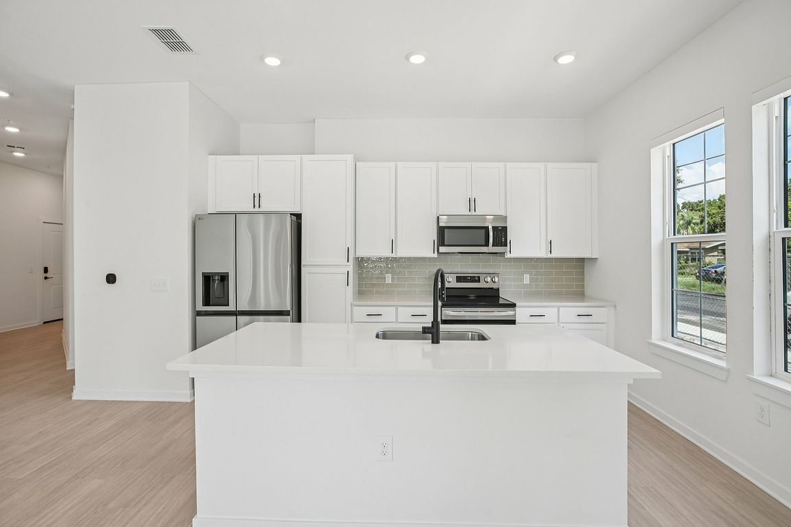 Kitchen with White Cabinets