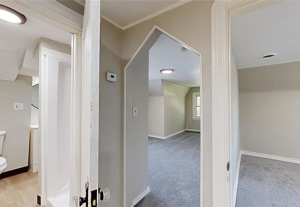 Bedroom, long living room, and full bathroom