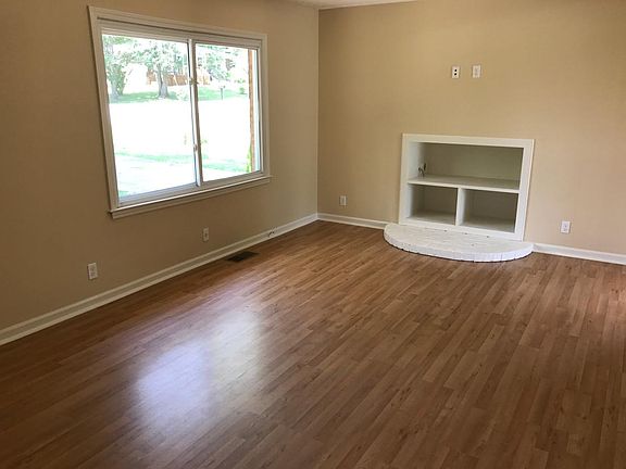 Laminate floors in Great Room, and built-in media cabinet.