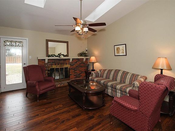 Wood burning fireplace and twin sky lights.