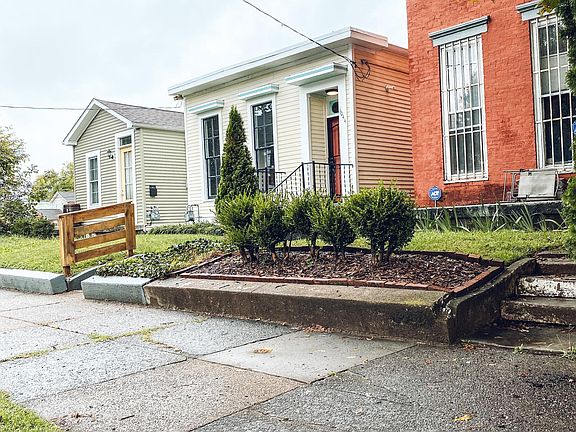 Street to the left of the house