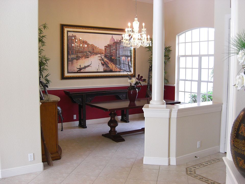 Foyer entrance, dining room on right