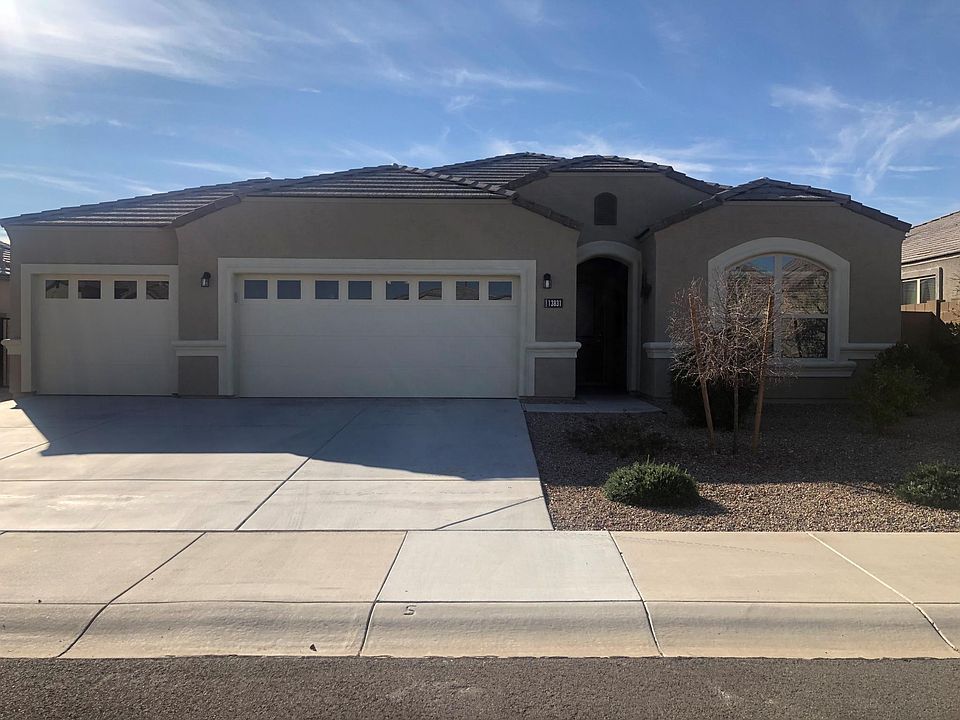 New home. Clean, easy maintenance front yard. Three cars garage.