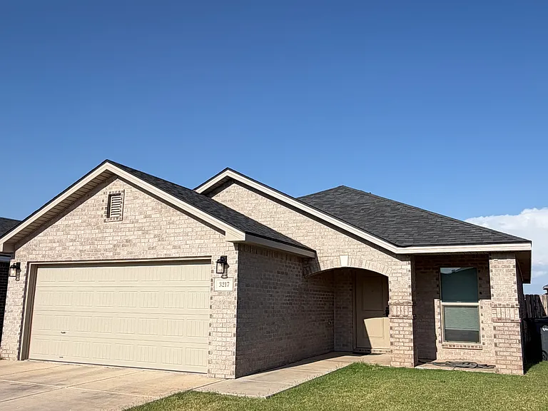 Beautiful new construction. New sod yard. Welcome home!