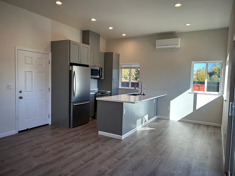 Open floor plan kitchen and living room, dining room area