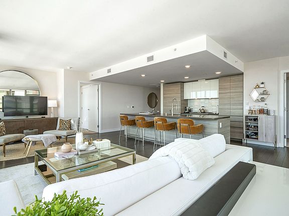Condo photos of a unit 3 floors above. Same floor plan.
