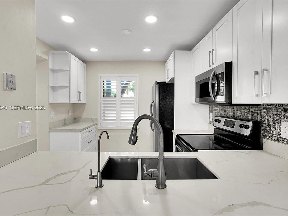 1st image of 10401 W Broward Blvd APT 205