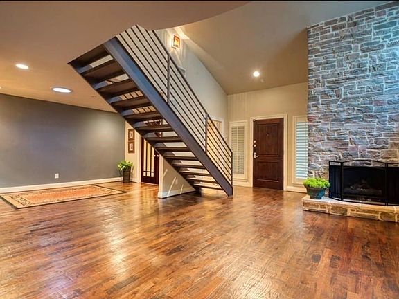 Please note the size and ceiling height in this gorgeous living area with floor to ceiling fireplace. This is a gas fireplace. All utilities are handled by the tenant.