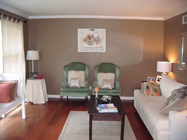 Living Room w/ Large Windows and Natural Light
