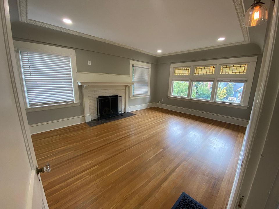 Living room with gas burning fireplace.