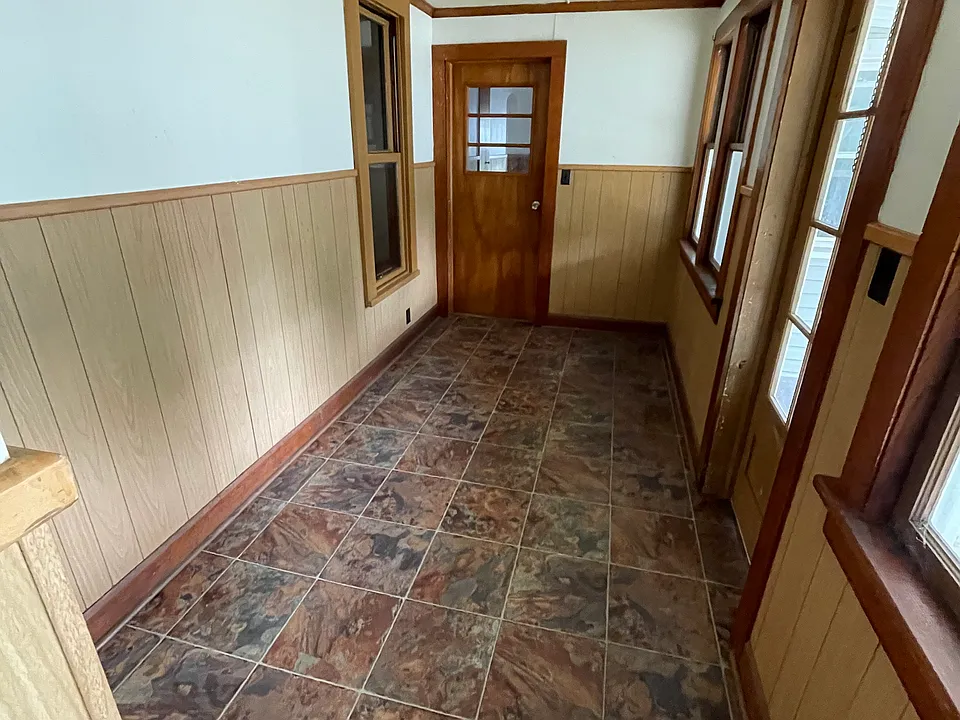 Large entryway with coat closet.