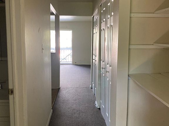 Spacious hallway with storage space.
