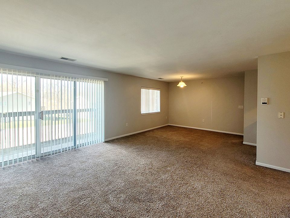 Open concept living areas with slider to private balcony