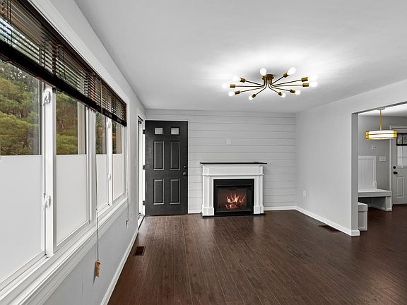 First floor Living Room with views of built in kitchen bench