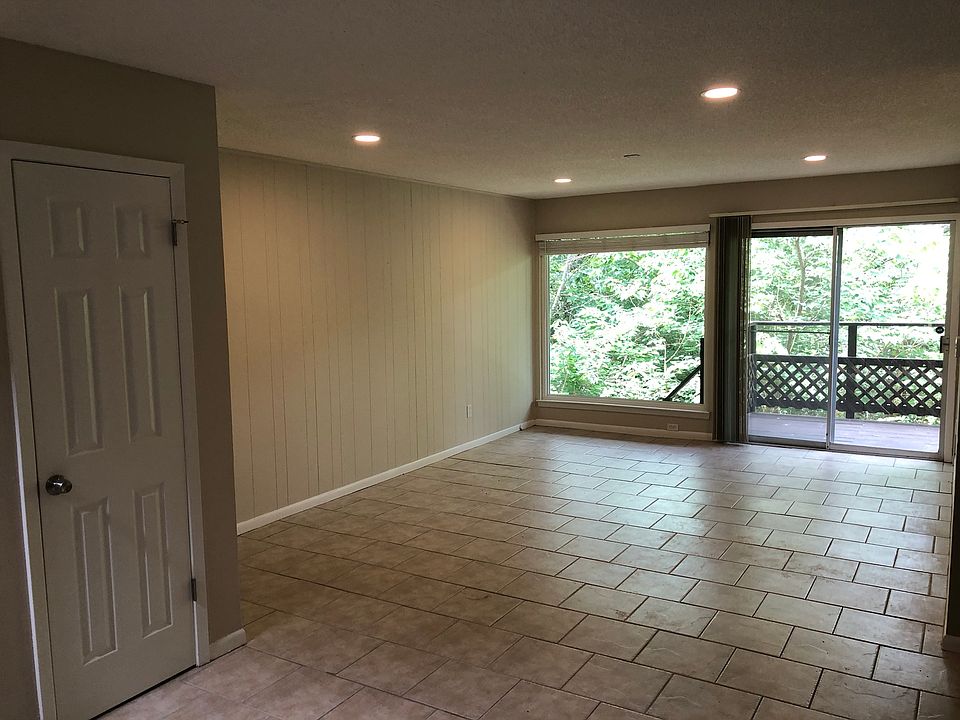 First floor Living Area with 6'x6' picture window and sliding glass door to first floor deck.