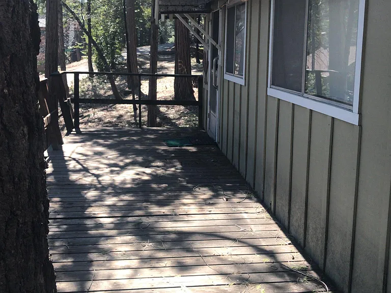 Deck wraps 1/2 of house.