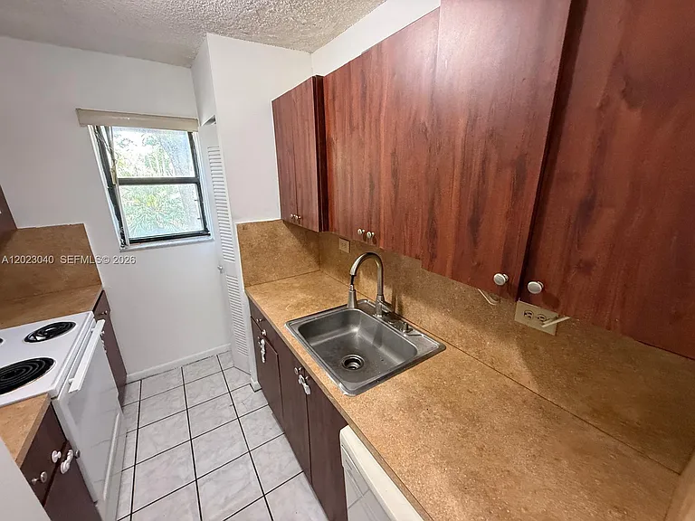 6975 NW 179th St #204 — Photo 4