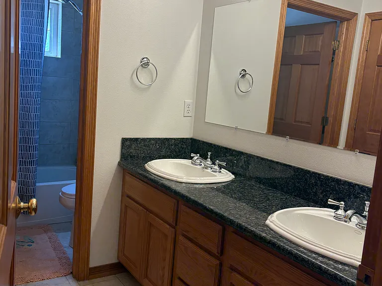 jack and jill bathroom with double sinks
