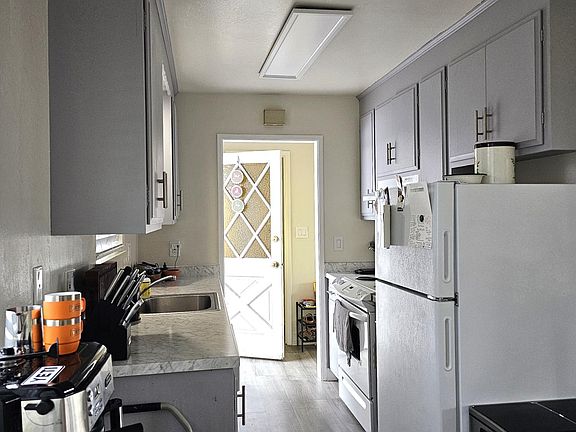 Kitchen (behind the open door, is the half bath)
