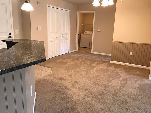 Kitchen looking toward laundry room and second bedroom.