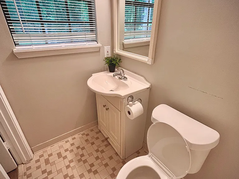 Master Bathroom with tile flooring and shower
