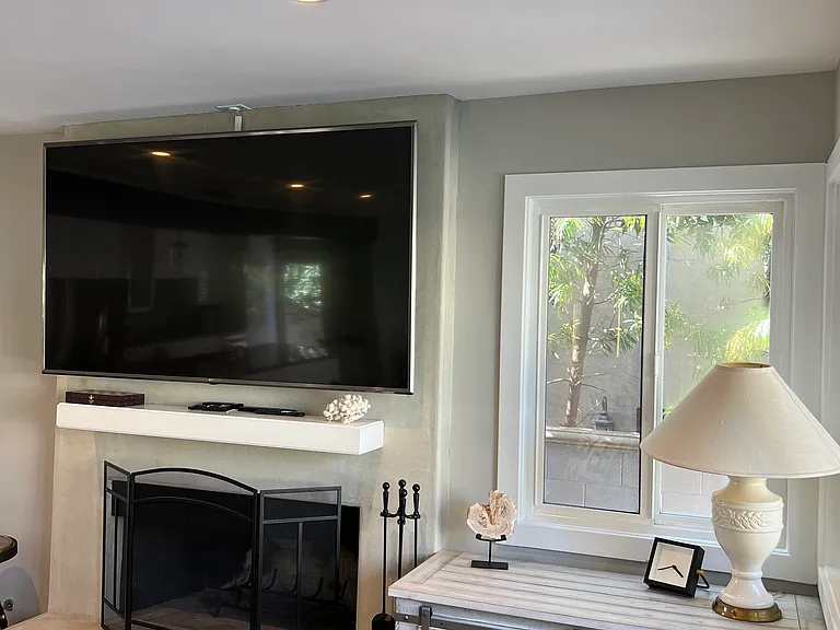 Downstairs living room with big screen tv and games