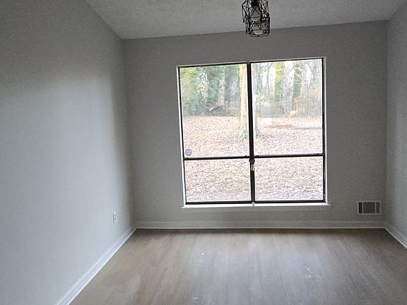 Seperate Large formal Dining with vaulted ceiling