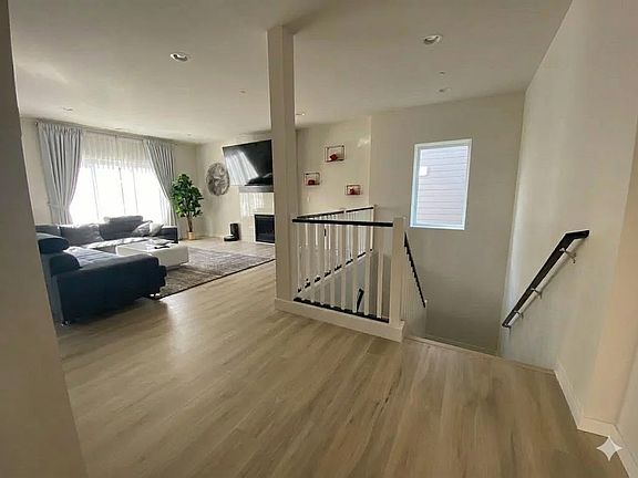 Basement stair and living room