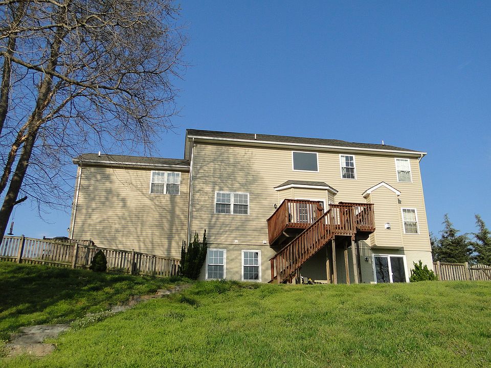 Back of home showing deck