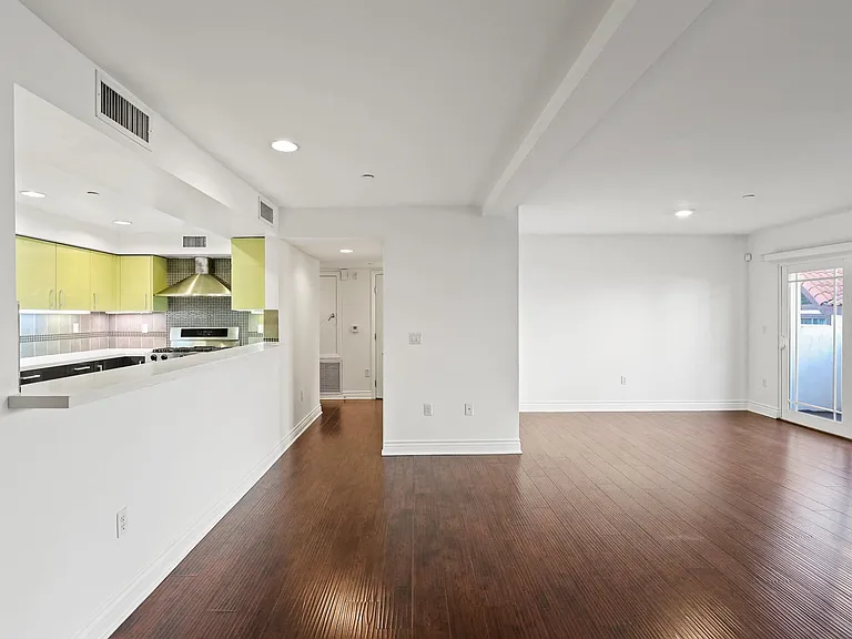 Open-Concept Kitchen, Dining, and Living Room Areas