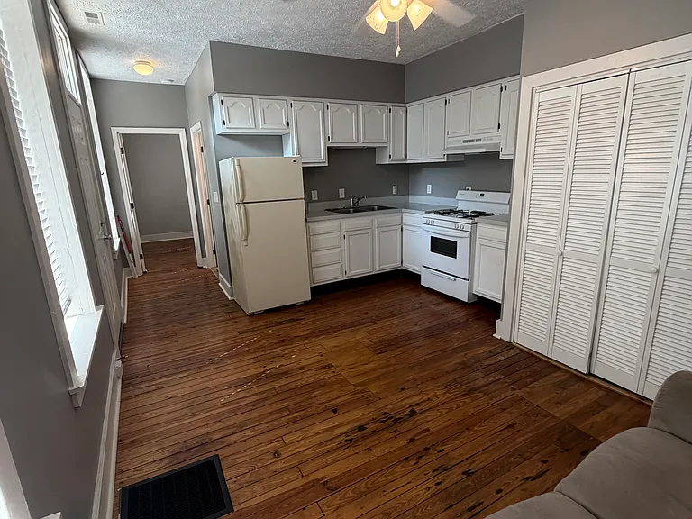 Kitchen. Facing toward bedroom.